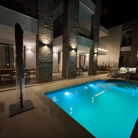 Turquoise Pool Side Thymus Apartment